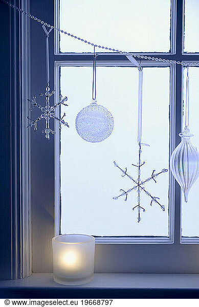 Ornaments and Candle by Window