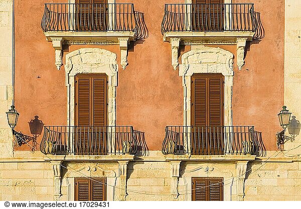 Ortigia  architectural detail of typical Sicilian balconies and shutters  Syracuse (Siracusa)  Sicily  Italy  Europe. This is a photo of architectural detail of typical Sicilian balconies and shutters in Ortigia  Syracuse (Siracusa)  Sicily  Italy  Europe.