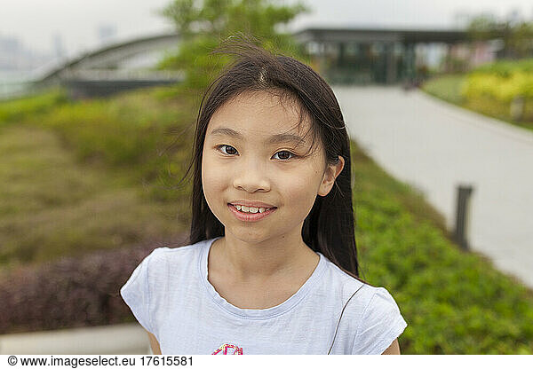 Outdoor portrait of a girl; Hong Kong  China