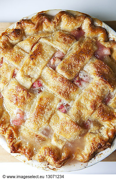 Overhead view of baked rhubarb pie on table