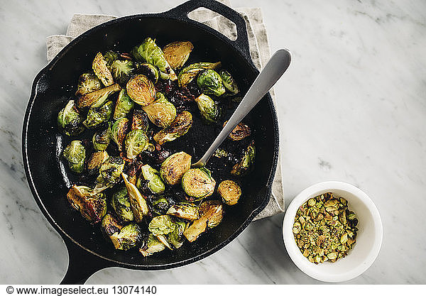Overhead view of Brussels sprouts in cooking pan