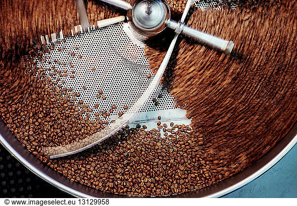 Overhead view of coffee beans in roaster