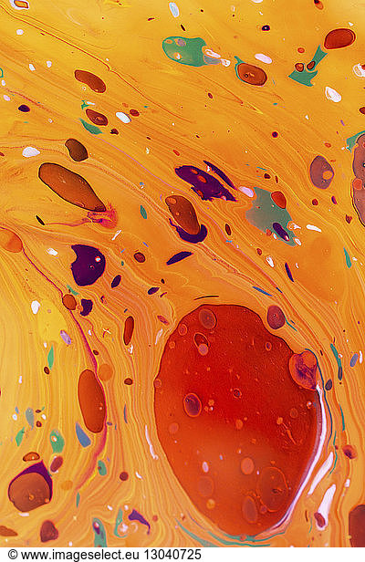 Overhead view of colorful marbling painting