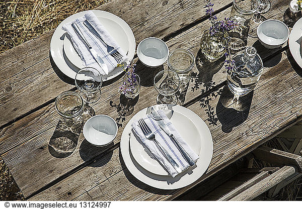Overhead view of crockery and silverware on table