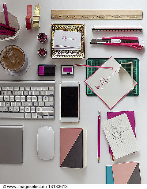 Overhead view of office supplies on desk