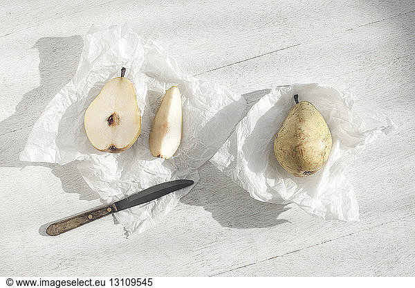 Overhead view of pears on wooden table