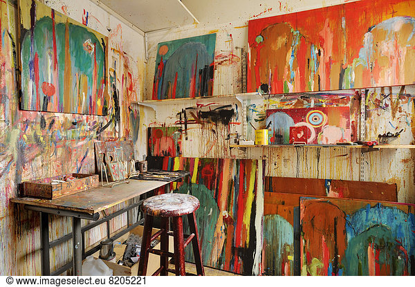 Paint splattered walls of art studio
