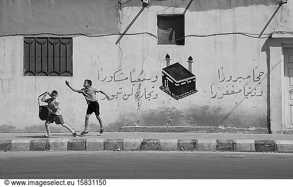 Palmyra  Homs  Syria - November 07  2005: Kids playing in the streets