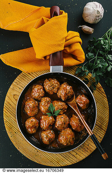Pan with hot homemade meatball stew seasoned with spices for flavor
