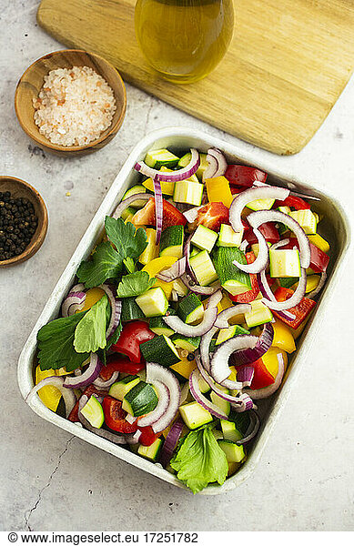 Pan with raw vegetable mix ready to cook