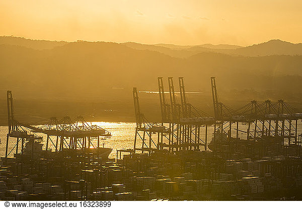 Panama  Panama City  Cargo harbour on the Panama canal at sunset