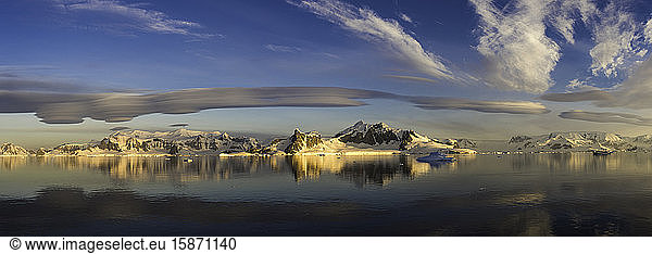 Panorama of mountains and lenticular clouds  Antarctica  Polar Regions
