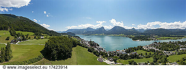 Panoramic view by Lake Wolfgangsee near mountain range on sunny day  Abersee  Salzkammergut  Salzburg  Austria