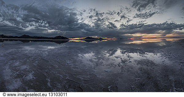 Panoramic view of Bonneville Salt Flats against cloudy sky