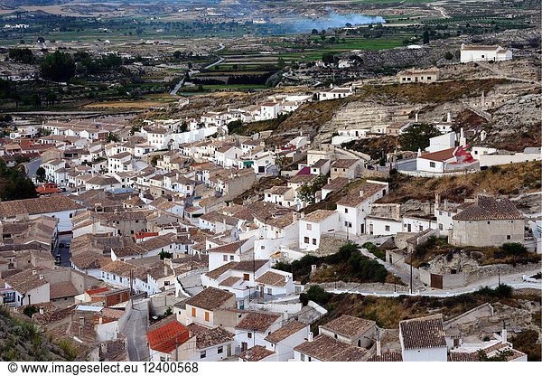 Panoramic view of Galera village in unspoilt cave country in mountainous region of northern Andalusia  between the Sierra Nevada and the Sierra de Castril  there are cave houses in entire village  municipality Huéscar  province of Granada  Andalusia  Spain  Europe