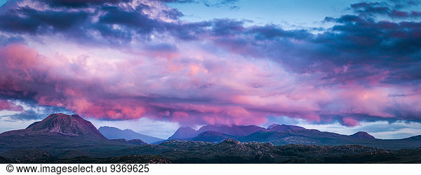 Panoramic view of pink clouds over remote landscape