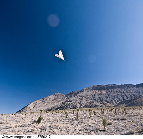 Paper aeroplane in Death Valley National Park  California  USA