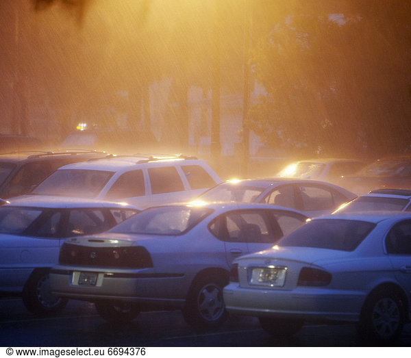 Parked Cars in a Rainstorm