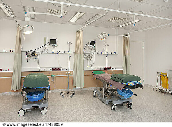 Patient facilities in a modern hospital  beds and patient bays  electronic equipment and curtains