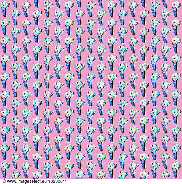 Pattern of origami chrysanthemums against pink background