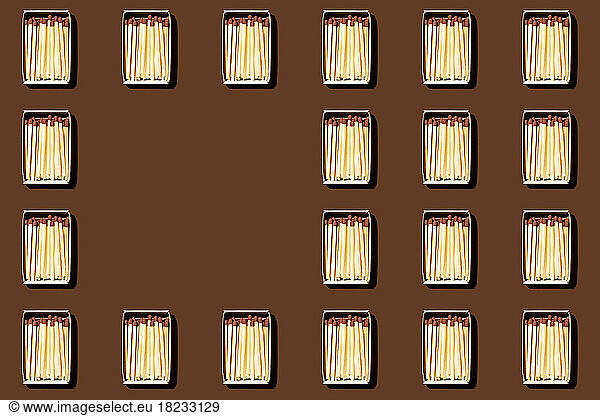 Pattern of rows of matchboxes with blank spot in center