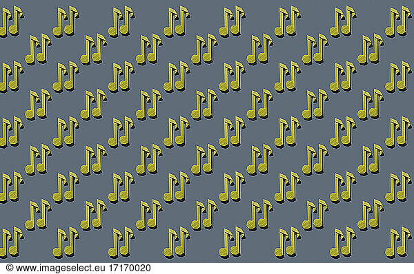 Pattern of yellow origami notes against gray background