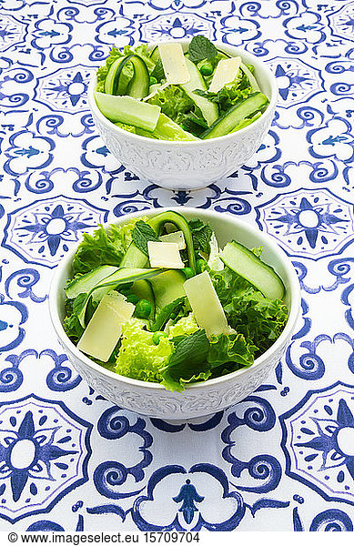 Pea and cucumber salad on patterned table