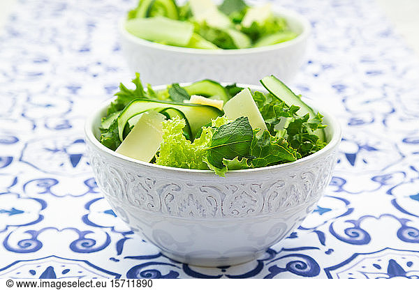 Pea and cucumber salad on patterned table
