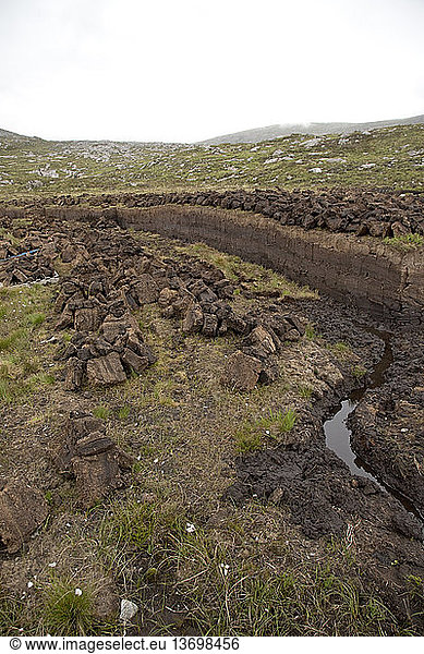 Peat cutting in the Outer Hebrides  Scotland.