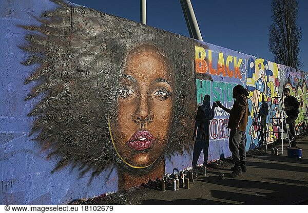 Pen_Chill  Germany  Berlin  21. 02. 2021  Mauerpark  Sunday afternoon  graffiti wall  graffiti artist Eme Freethinker  portrait of a coloured woman  Europe