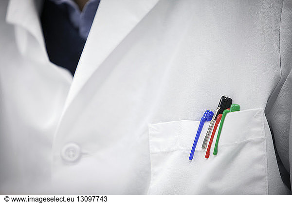 Pens in lab coat pocket