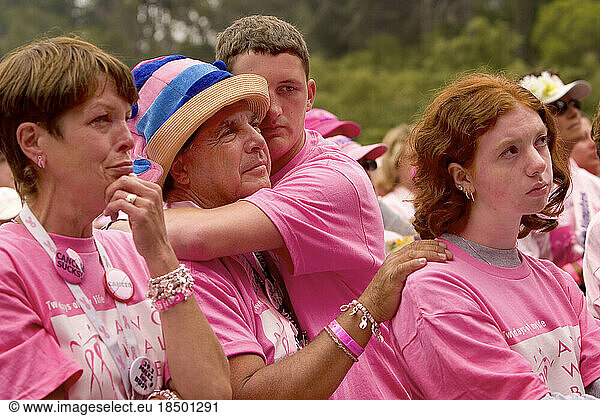 People are moved to tears at the end of a San Francisco breast cancer walk.