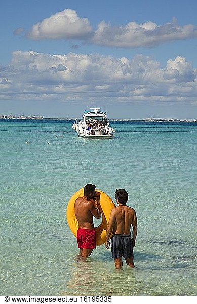 People at the sandy beach  Isla Mujeres  Cancun  Quintana Roo  Mexico  Central America.