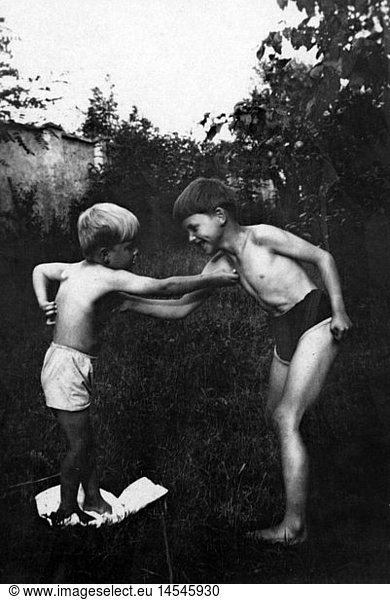 people  child / children  siblings  brothers boxing playfully  1920s