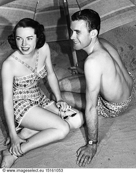 people  couples  1950s  young couple on the beach  1950s