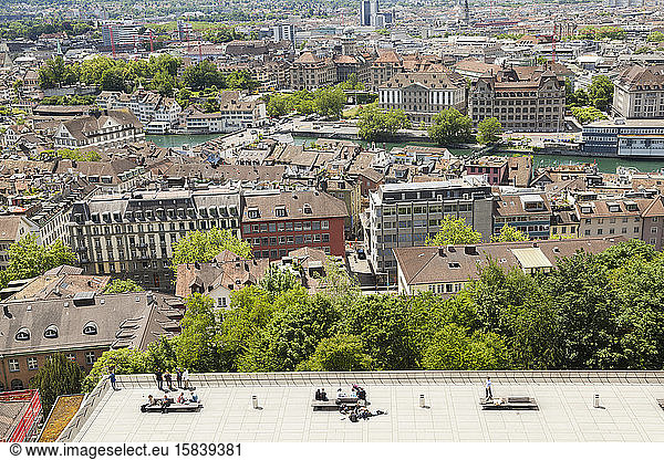 People enjoy the view from a large terrace in ZÃ¼rich  Switzerland