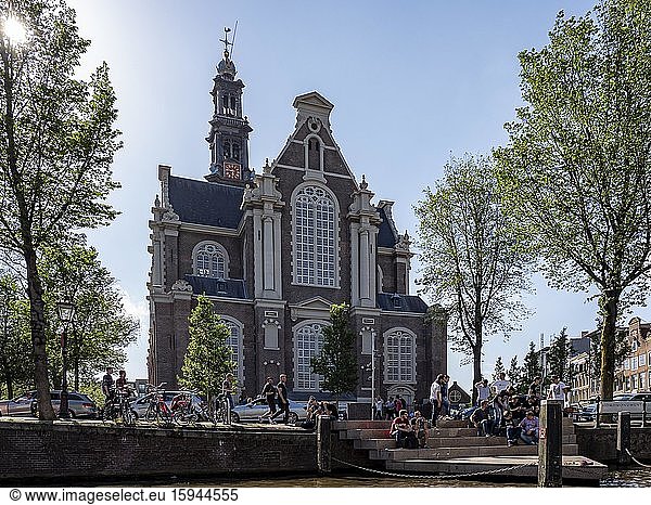 People meet in front of the church Westerkerk  Amsterdam  Kingdom of the Netherlands