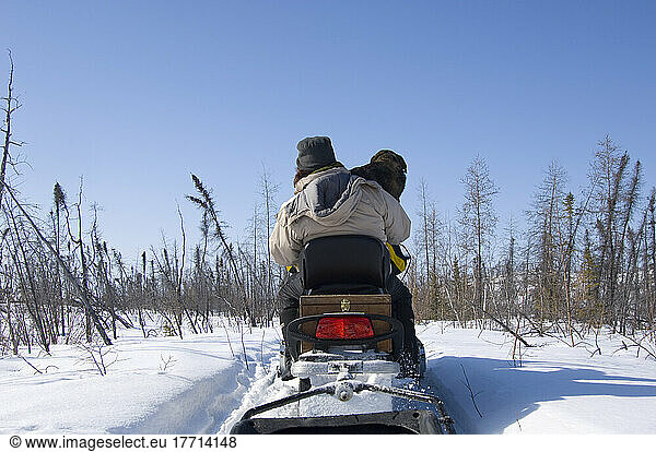 People On A Snow Mobile  Gordon Lake  Northwest Territories