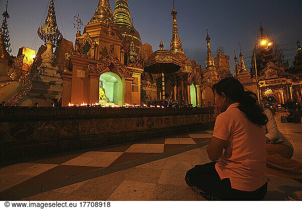 People Praying At Shwedagon Pagoda; Yangon  Burma