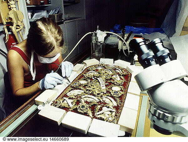 people  professions  conservator  textile conservator working on a exhibit  early 1990s