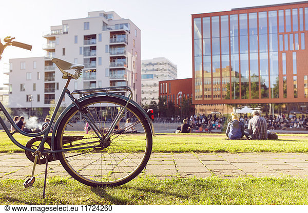 People relaxing in city