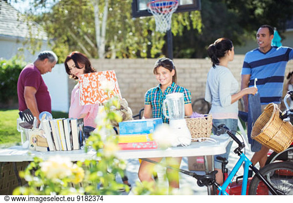 People shopping at yard sale
