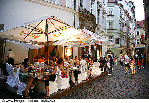 People sitting at a restaurant in the old town  Stare Mesto  Prague  Czech Republic.