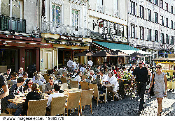 People sitting at an outdoors cafe on Place du Vieux Marche in Rouen  Normandy  France.