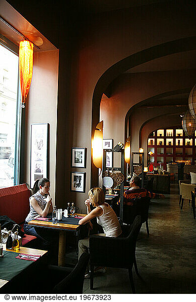 People sitting at No Stress Restaurant on Dusni 10  Josefov  Prague  Czech Republic.
