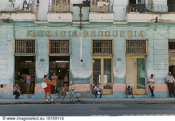 People waiting outside the pharmacy in old Havana  Cuba