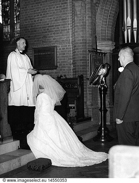 people  wedding  ceremony  bride during the wedding ceremony in the church  1950s