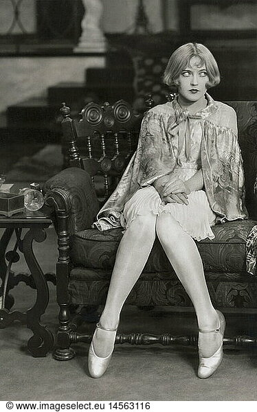 people  woman  full length  sitting  1920s  20s  20th century