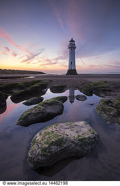 Perch Rock Lighthouse at New Brighton reflected with dramatic sunset  New Brighton  Cheshire  England  UK