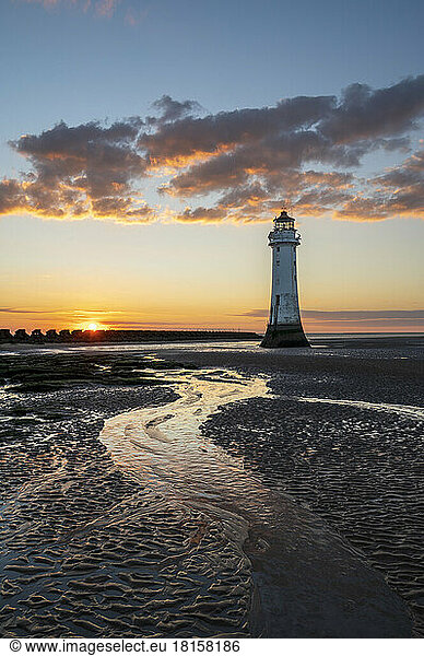 Perch Rock lighthouse reflected in sand ripples  The Wirral  New Brighton  Cheshire  England  United Kingdom  Europe